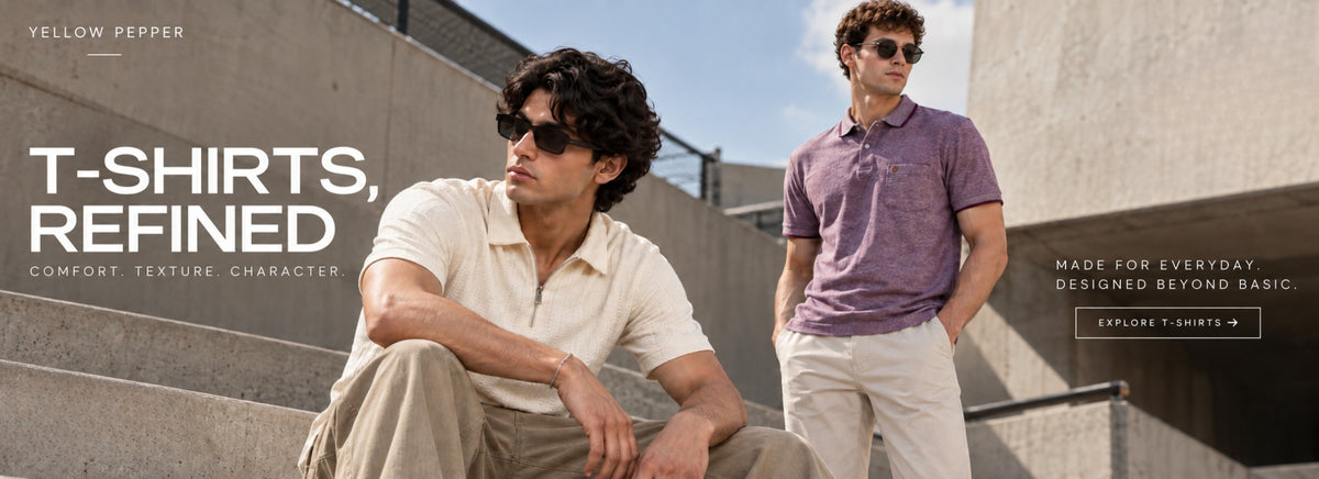 Two male models wearing sunglasses and polo shirts sitting and standing on concrete outdoor steps. The scene is branded with 'Yellow Pepper' and the text 'T-Shirts, Refined' with a callout on the right.